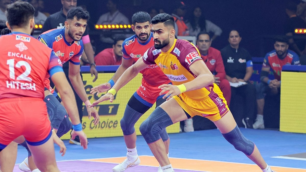 | Photo: Pro Kabaddi League : Gujarat Giants players in action against U Mumba in Match 4 of PKL 12.