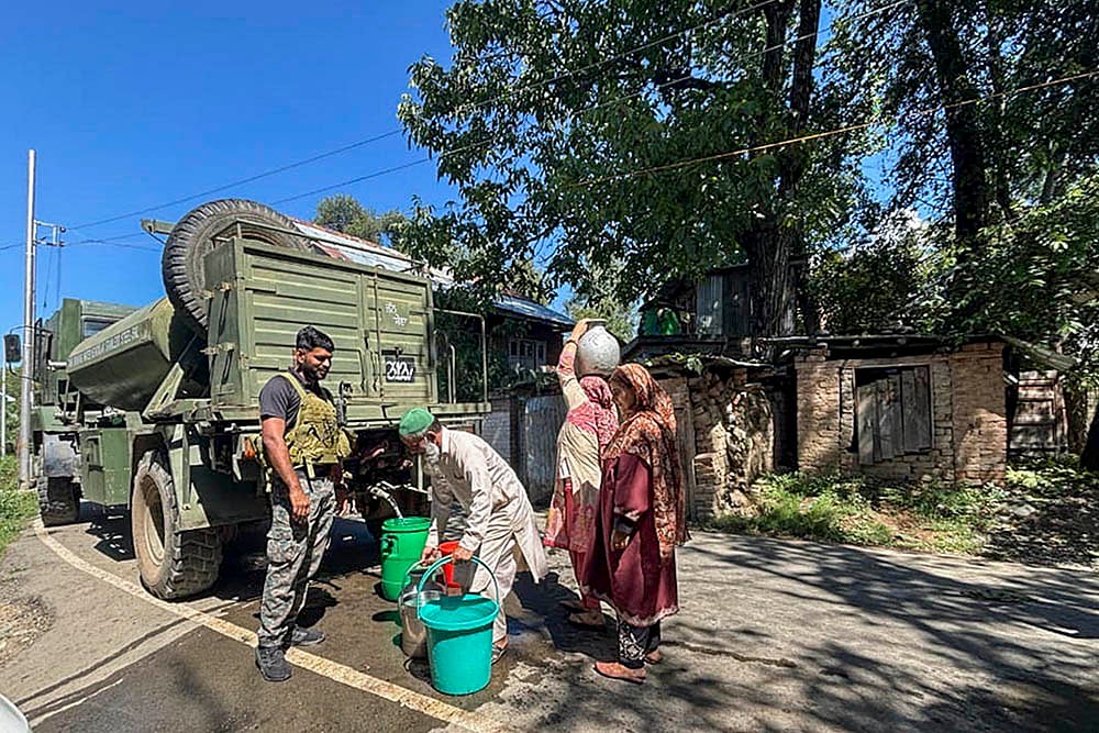 | Photo: PTI : Army provides water to villages hit by shortage