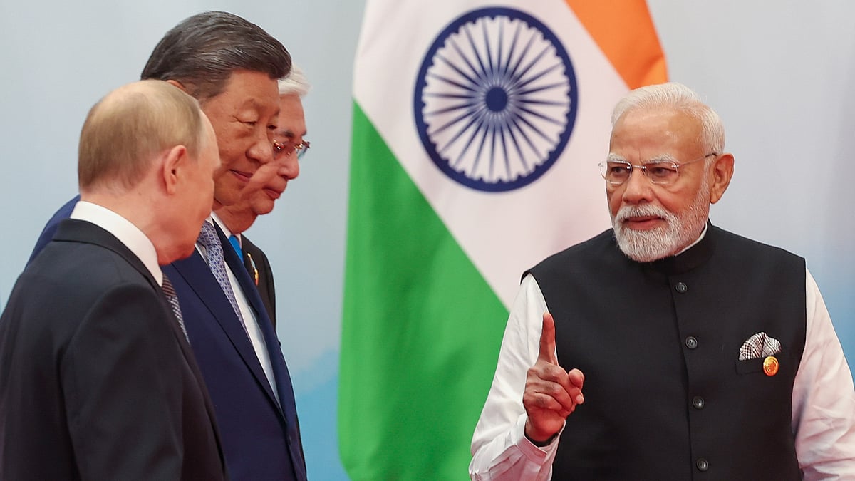 PTI | : PM Narendra Modi with Russian President Putin and China's Xi Jinping | 