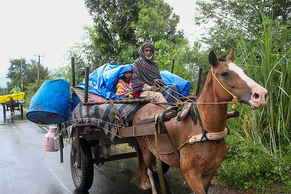 Flood-affected people move to safer place in Jammu district
