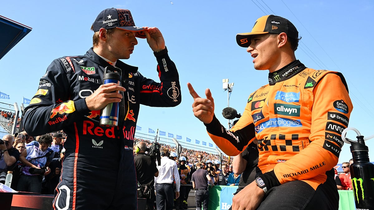 Red Bull's Max Verstappen With McLaren's Lando Norris.