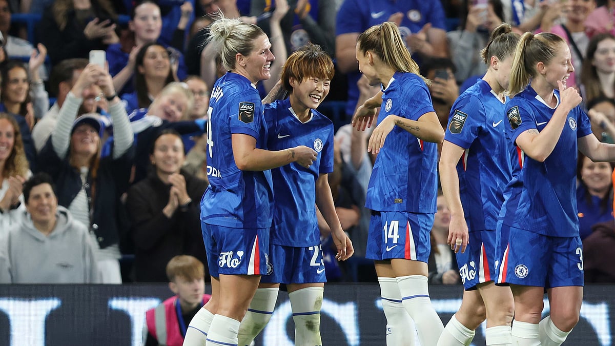 Maika Hamano celebrates with her Chelsea team-mates after scoring against Manchester City - null