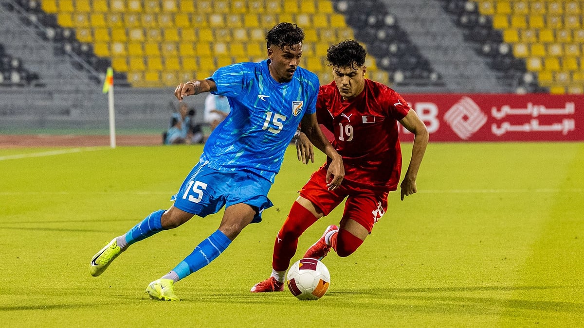 | Photo: X/IndianFootball : India's Macarton Nickson in action against Bahrain's Khaled Alkhalaf in the AFC U23 Asian Cup 2026 Qualifiers.