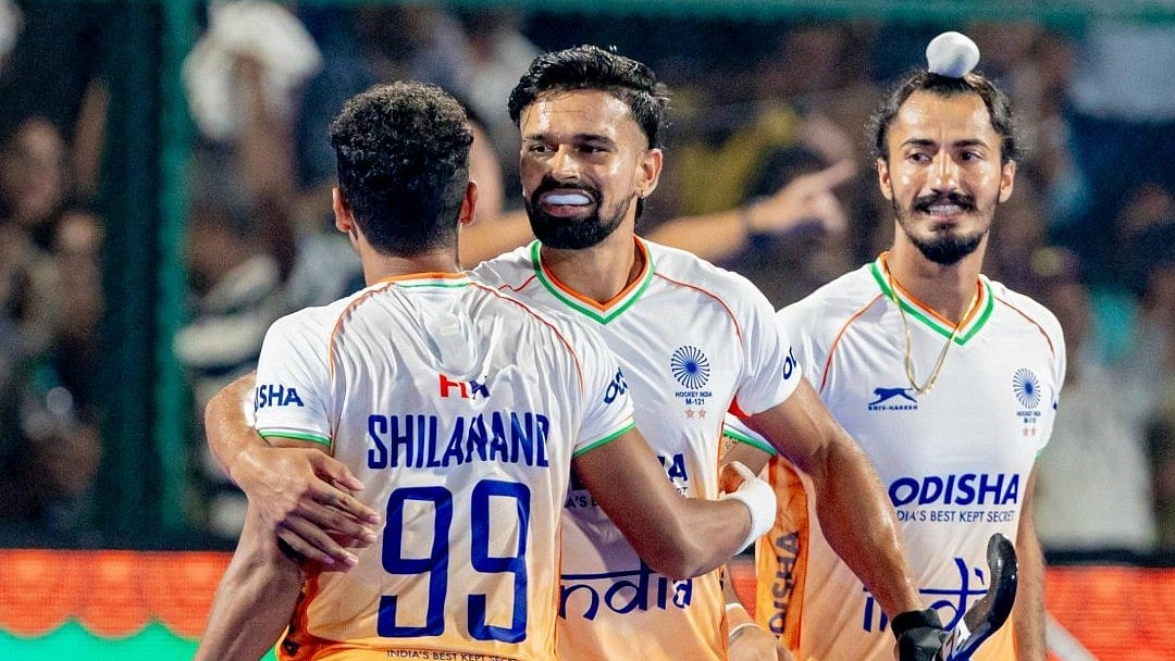X/TheHockeyIndia : Shilanand Lakra (no 99 jersey) celebrates a goal.