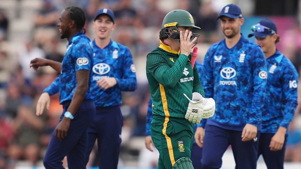 AP : South Africa's Matthew Breetzke, front, leaves the field after England's Jofra Archer, rear left, took his wicket during the third ODI.