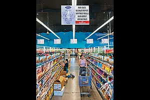 Photo: Getty Images : Competitive Disadvantage: Customers shop at the Pioneer Cash and Carry in Little India on August 1, 2025, in Artesia, California
