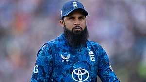 | Photo: File : File photo of Adil Rashid in action for England.