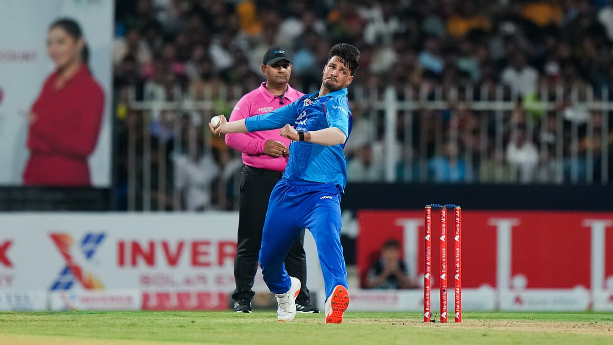 | Photo: X/ACBofficials : Afghanistan's AM Ghazanfar in action against Pakistan in the UAE Tri-Series 2025.