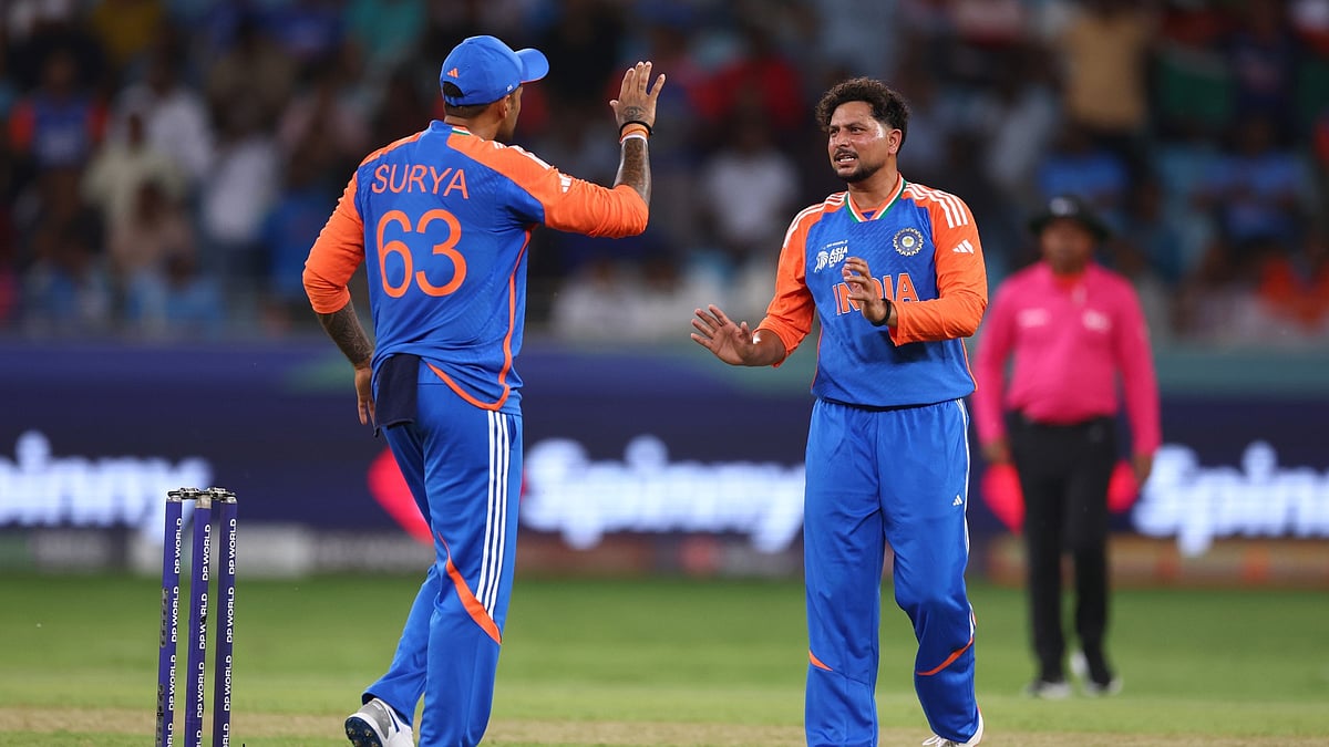 India's Kuldeep Yadav and Suryakumar Yadav in the Asia Cup 2025 match against UAE.