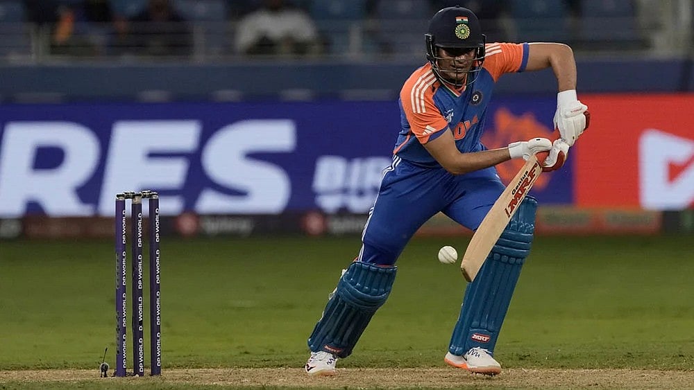 | Photo: AP/Fatima Shbair : Asia Cup T20: Shubman Gill bats during India's match against UAE.