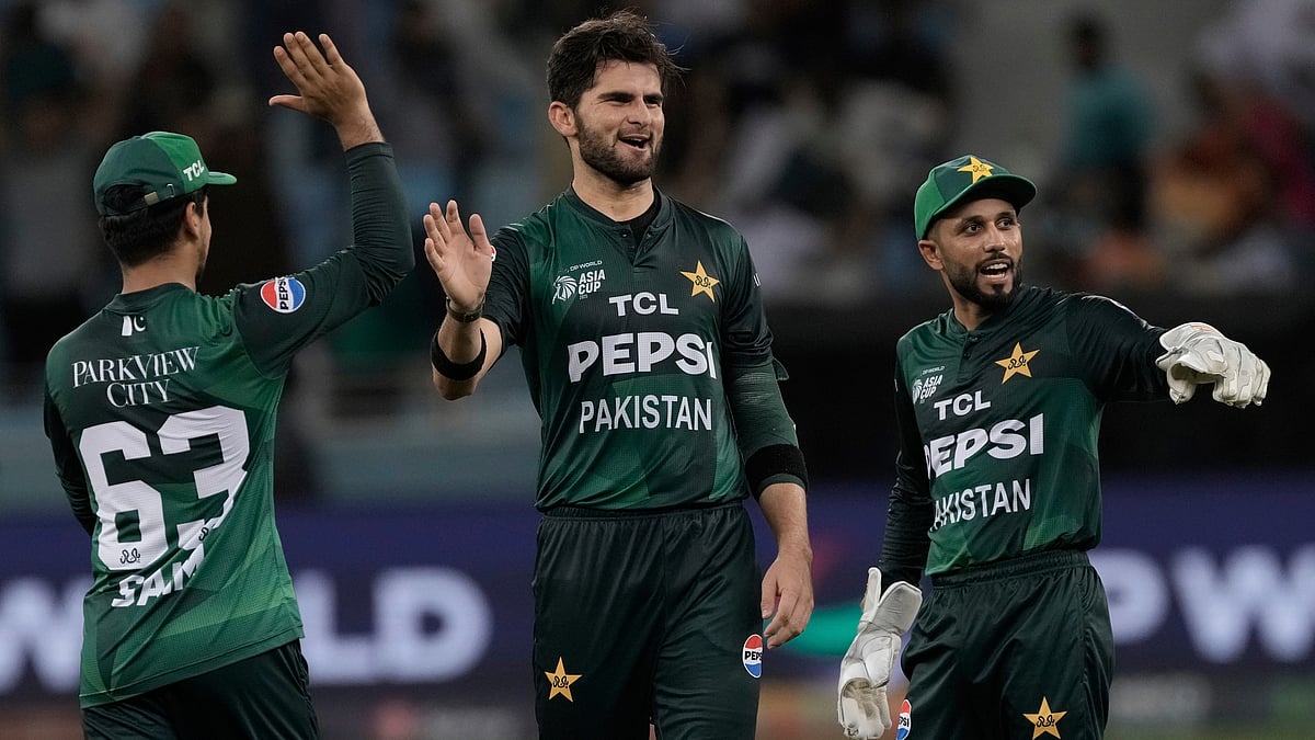 | Photo: AP/Fatima Shbair : Pakistan's Shaheen Shah Afridi, center, celebrates with teammates after the dismissal of Oman's Shah Faisal during the Asia Cup Cricket match between Oman and Pakistan at Dubai International Cricket stadium in Dubai, United Arab Emirates, Friday, Sept. 12, 2025. 