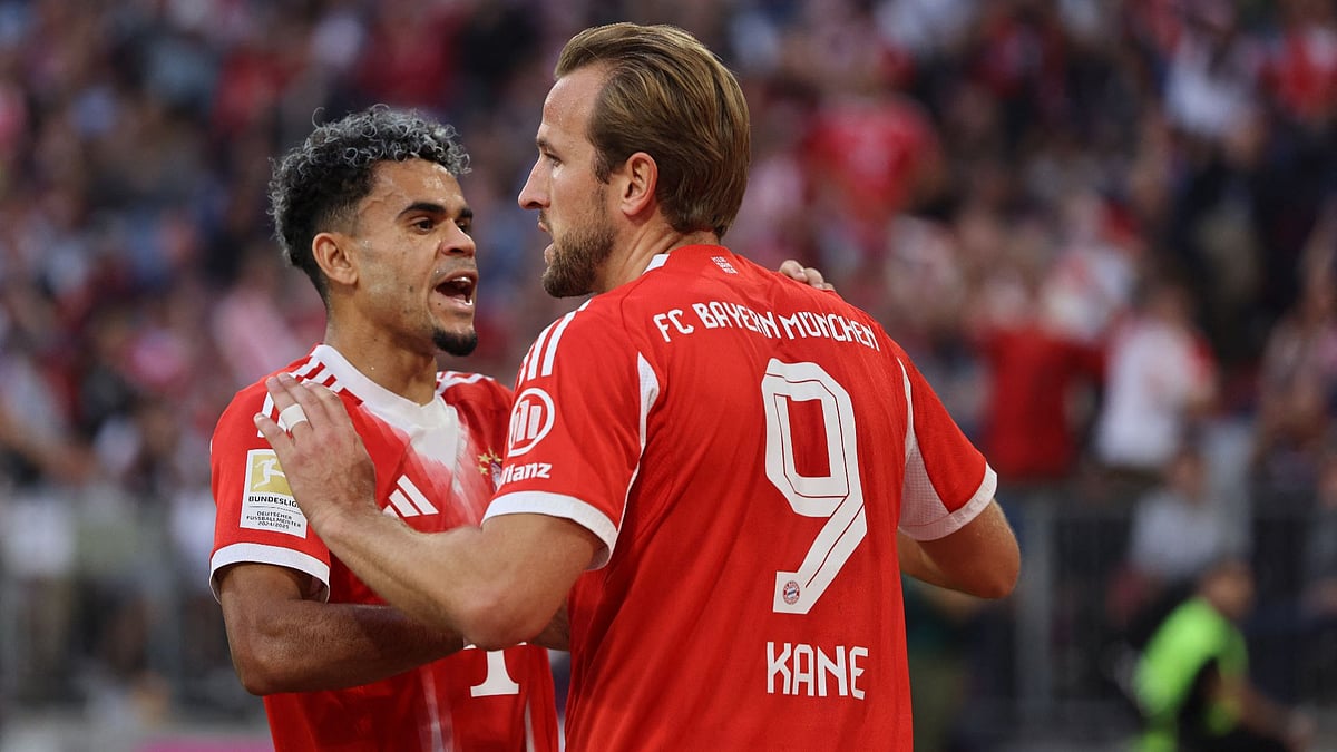Kane (right) and Luis Diaz celebrate - null