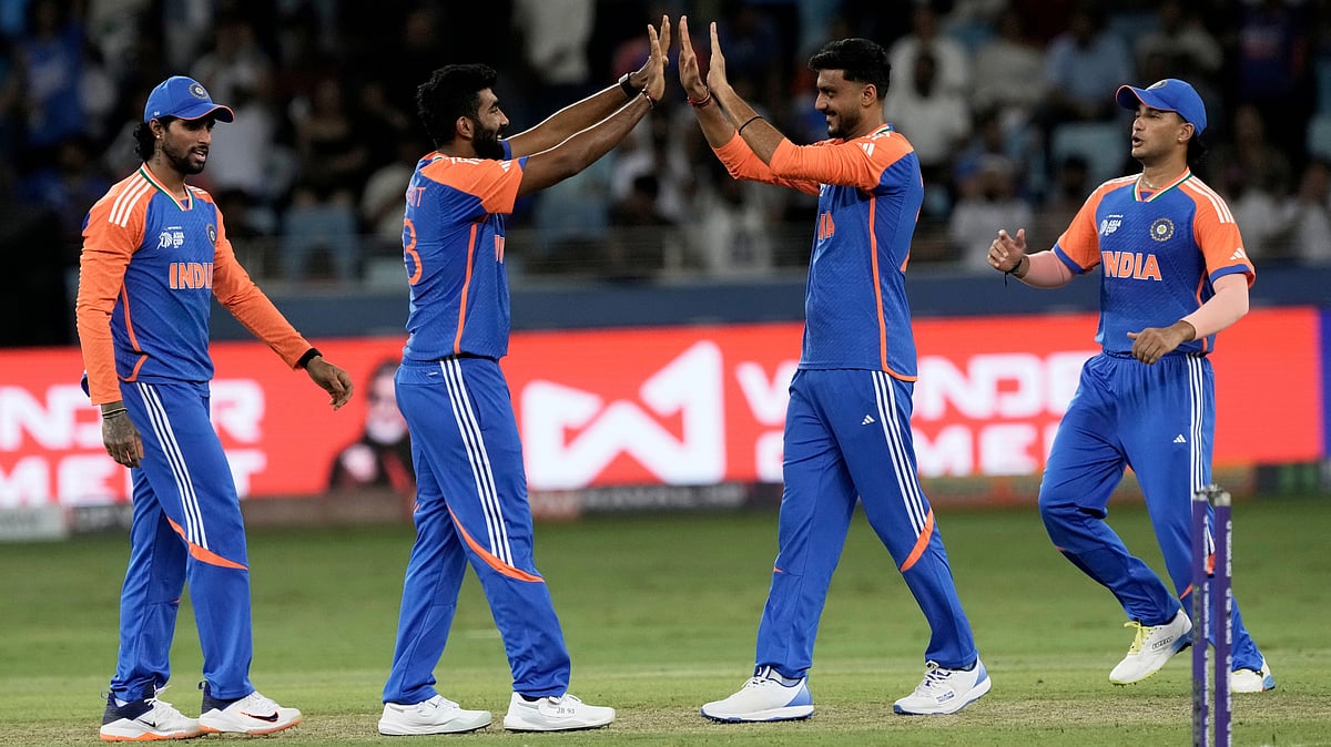 | Photo: AP/Fatima Shbair : India's Jasprit Bumrah , second left, celebrate the wicket of United Arab Emirates's Alishan Sharafu during the Asia Cup Cricket match between United Arab Emirates and India at Dubai International Cricket stadium in Dubai, United Arab Emirates, Wednesday, Sept. 10, 2025. 