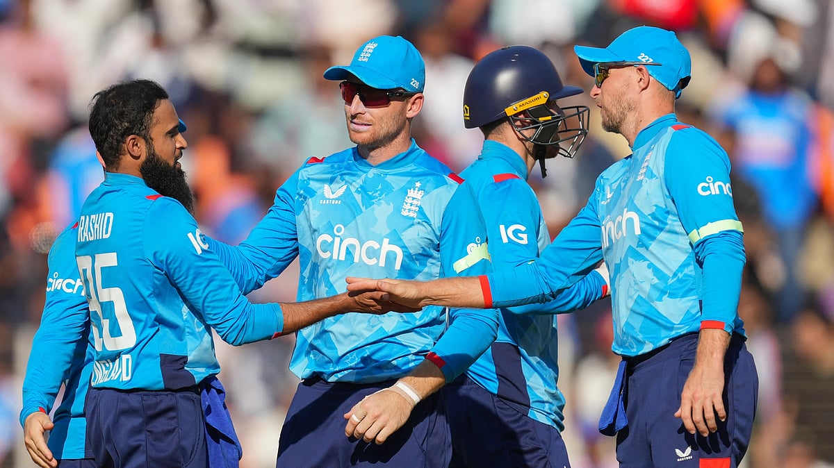 (AP Photo/ Ajit Solanki ) : England's Adil Rashid, left, celebrates the wicket of India's Hardik Pandya with his team mates during the third one day international cricket match between India and England in Ahmedabad , India, Wednesday, Feb. 12, 2025.