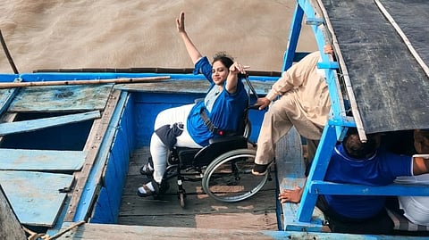 Madhuri touring the Chilka lake.