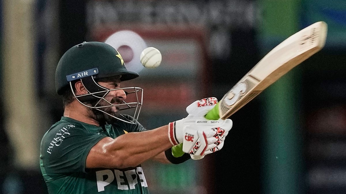 (AP Photo/Fatima Shbair) : Pakistan's Sahibzada Farhan bats during the Asia Cup cricket match between India and Pakistan at Dubai International Cricket Stadium in Dubai, United Arab Emirates, Sunday, Sept. 14, 2025.