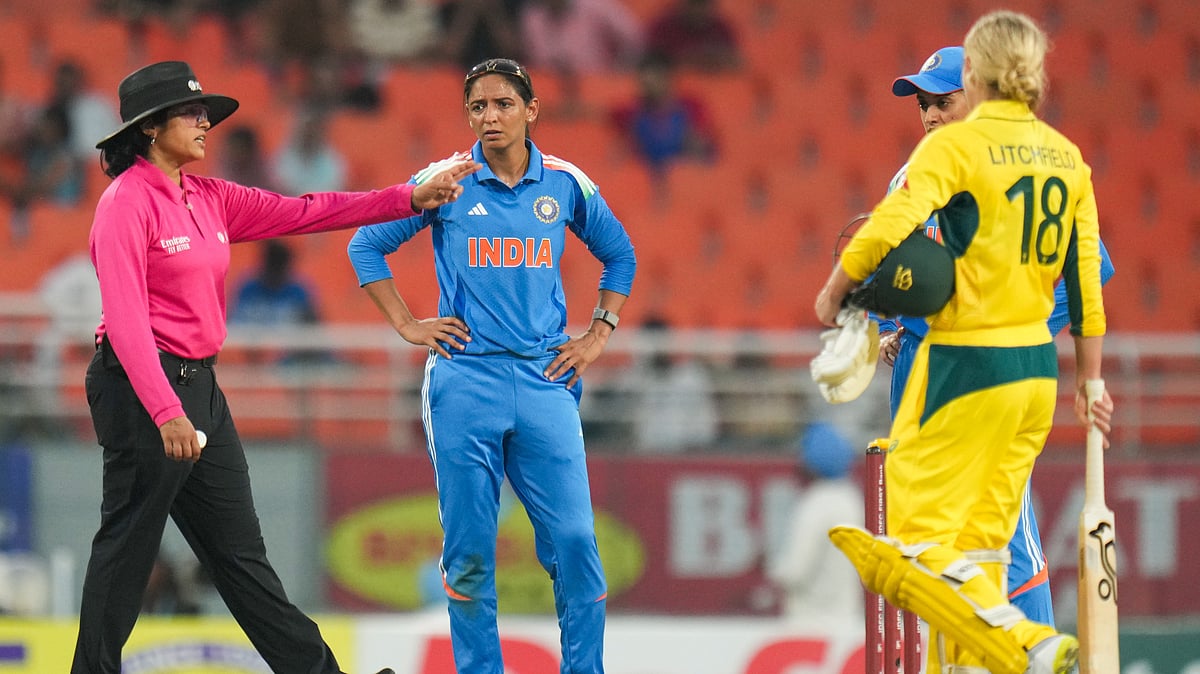 PTI : India's captain Harmanpreet Kaur, center, and Smriti Mandhana, right, interact with an umpire during the first ODI cricket match between India Women and Australia Women