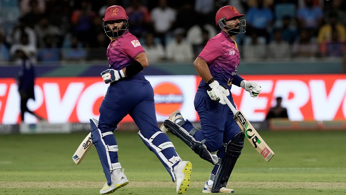 | Photo: AP/Fatima Shbair : United Arab Emirates's Alishan Sharafu, left, and United Arab Emirates's captain Muhammad Waseem run between the wickets during the Asia Cup Cricket match between United Arab Emirates and India at Dubai International Cricket stadium in Dubai, United Arab Emirates, Wednesday, Sept. 10, 2025.