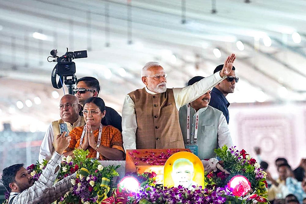 | Photo: PTI : PM Modi in MP's Dhar district