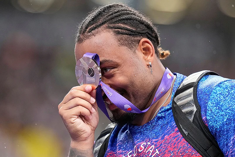 Curtis Thompson celebrates after winning bronze medal in the mens javelin throw final