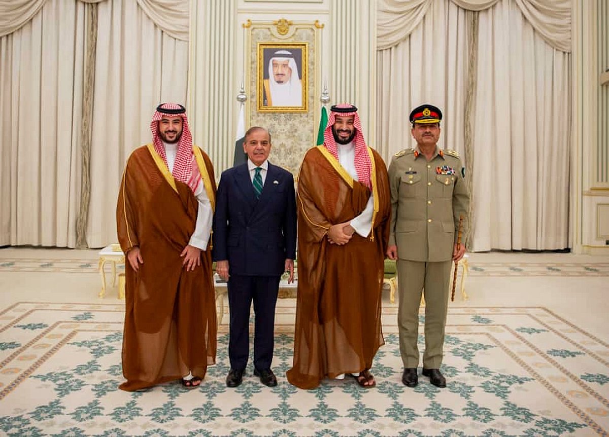 Press Information Department via AP : In this photo released by Pakistan's Press Information Department, Saudi Arabia's Crown Prince Mohammed bin Salman, second right, Saudi Arabia's Defence Minister Khalid bin Salman, left, Pakistan's Prime Minister Shehbaz Sharif, second left, and Pakistan's Army Chief Field Marshal Asim Munir, pose for photographs after signing a mutual defense pact, in Riyadh, Saudi Arabia, Wednesday, Sept. 17, 2025.