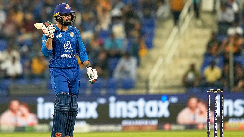 AP : Afghanistan's Mohammad Nabi reacts after completing his fifty runs during the Asia Cup match against Sri Lanka at Zayed Cricket Stadium in Abu Dhabi.