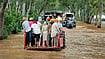 Curse Of The Cusecs: How Punjab Floods Washed Away Lives And Homes Within Minutes | Photo: Imago/ANI News : The Day After: Villagers commute on tractors through the flood waters at Ghonewala village near the India-Pakistan border on September 4, 2025