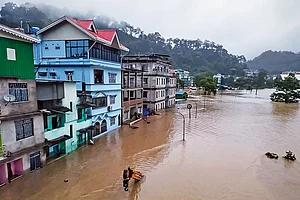 | Photo: PTI : Hard-Hit: Flooding at Muguthang in North Sikkim caused by a sudden cloudburst over Lhonak Lake