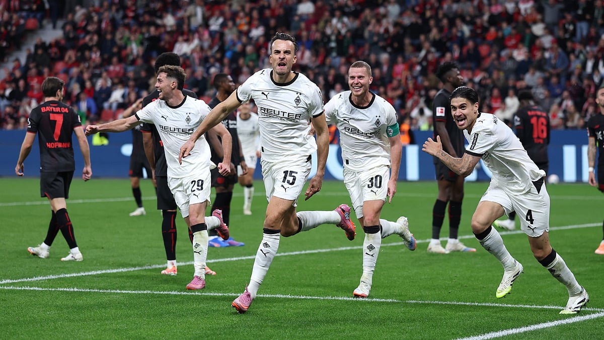 Borussia Monchengladbach celebrate Haris Tabakovic's late equaliser against Bayer Leverkusen.