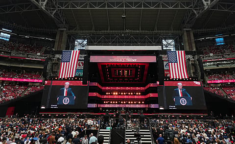 US President Donald Trump speaking at the public funeral |