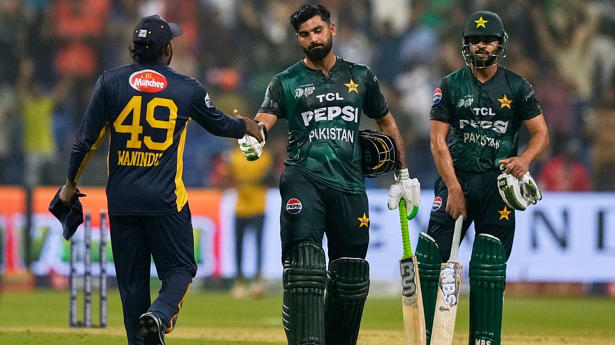 | Photo: AP/Altaf Qadri : Pakistan's Hussain Talat shakes hands with Sri Lanka's Wanindu Hasaranga after winning the Asia Cup cricket match between Pakistan and Sri Lanka at Zayed Cricket Stadium in Abu Dhabi, United Arab Emirates, Tuesday, Sept. 23, 2025.