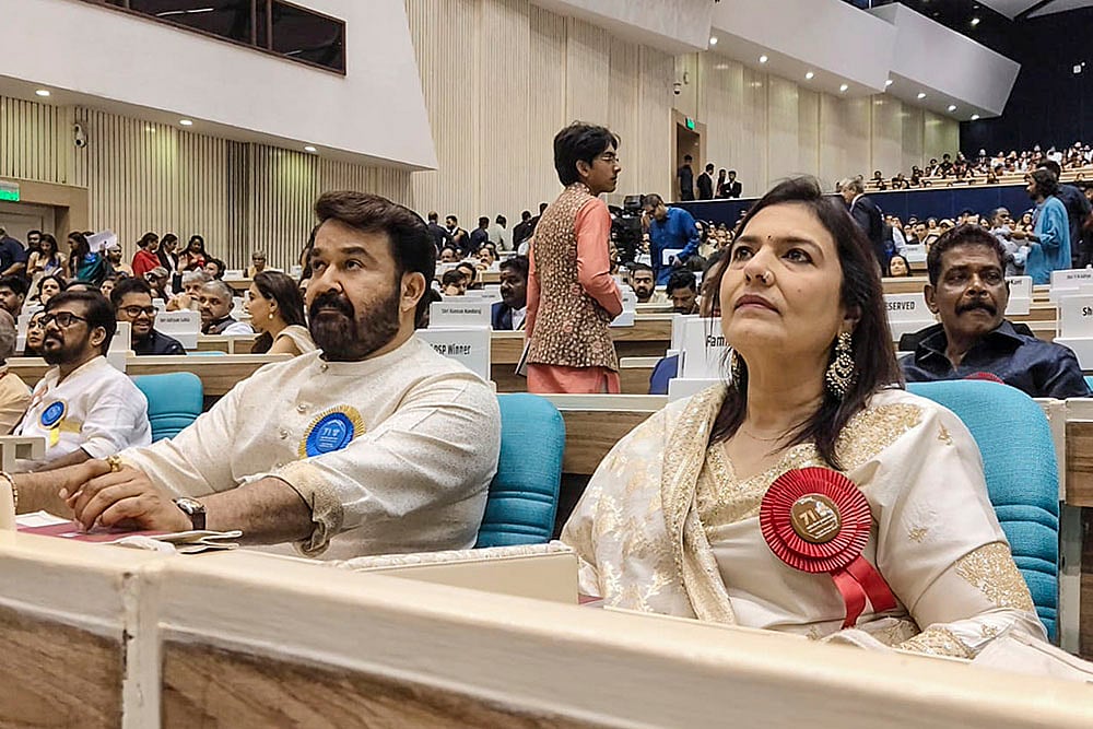 Mohanlal with his wife Suchitra Mohanlal during 71st National Film Awards