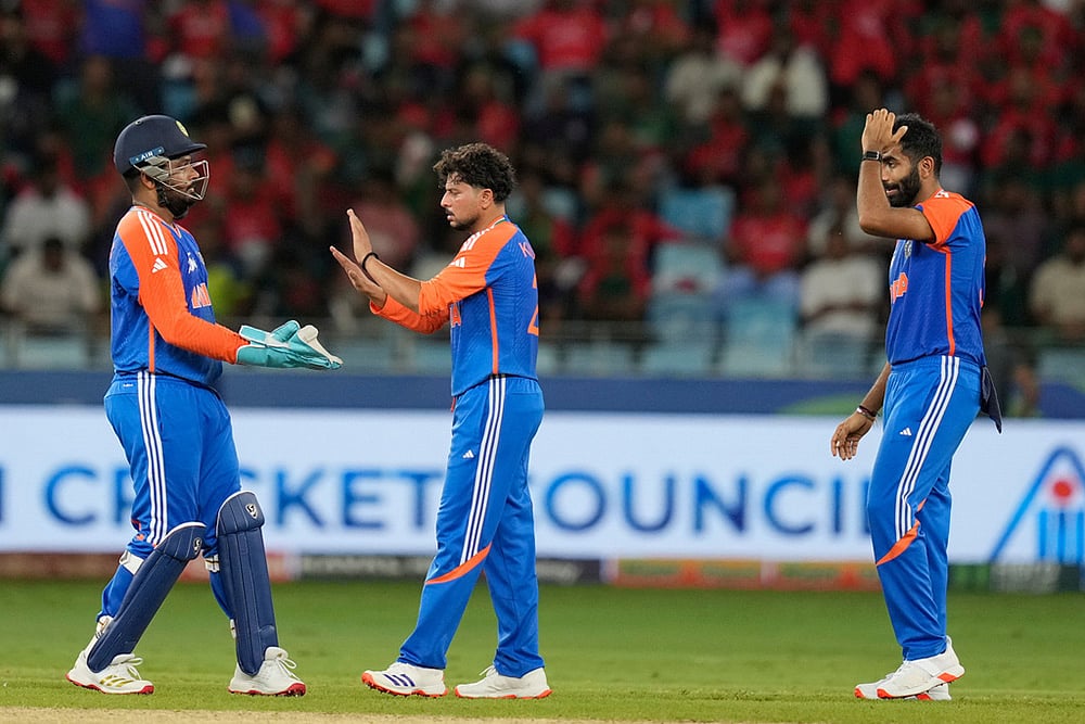 Asia Cup cricket Super 4 match India vs Bangladesh photos_Kuldeep Yadav