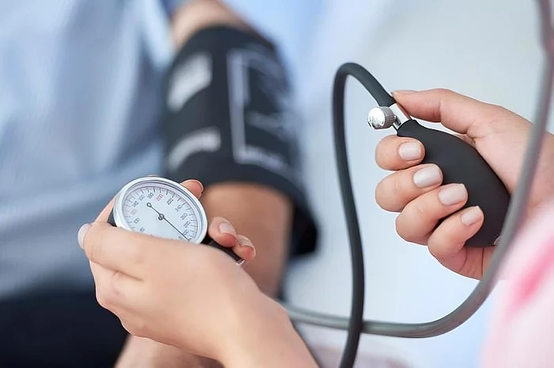 A man getting his blood pressure checked