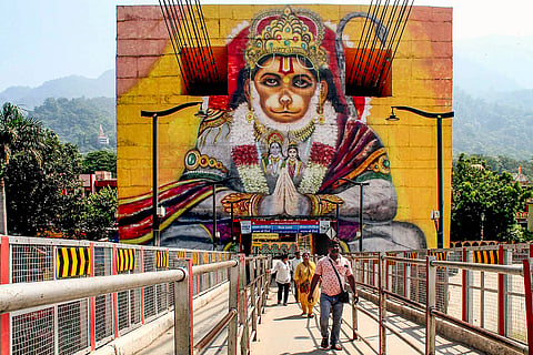 People cross Janaki Setu bridge in Rishikesh