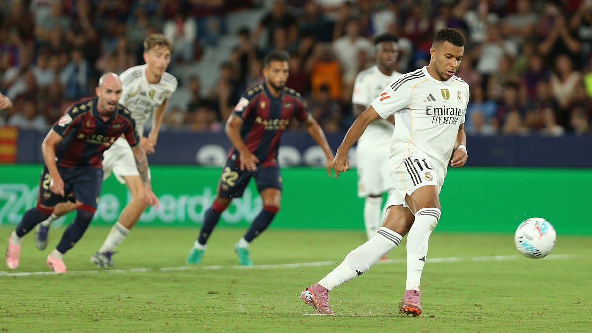 | Photo: AP/Alberto Saiz : Real Madrid's Kylian Mbappe, scores his sides fourth goal with a penalty kick during the Spanish La Liga soccer match between Levante and Real Madrid at the Ciutat de Valencia stadium in Valencia, Spain, Tuesday, Sept. 23, 2025. 