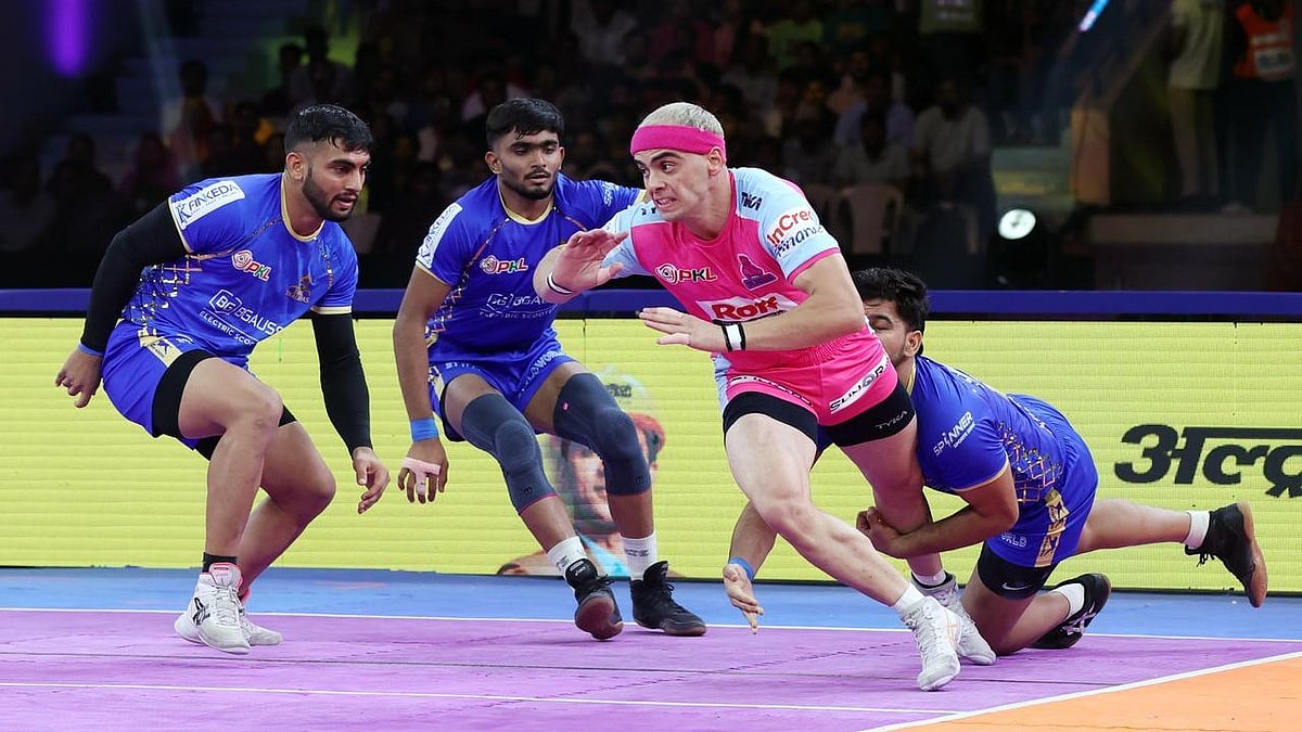 Action from the Pro Kabaddi League 2025 match between Tamil Thalaivas and Jaipur Pink Panthers. - Pro Kabaddi