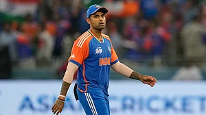 AP : India's captain Suryakumar Yadav walks back after the first innings during the Asia Cup final against Pakistan at Dubai International Cricket Stadium.