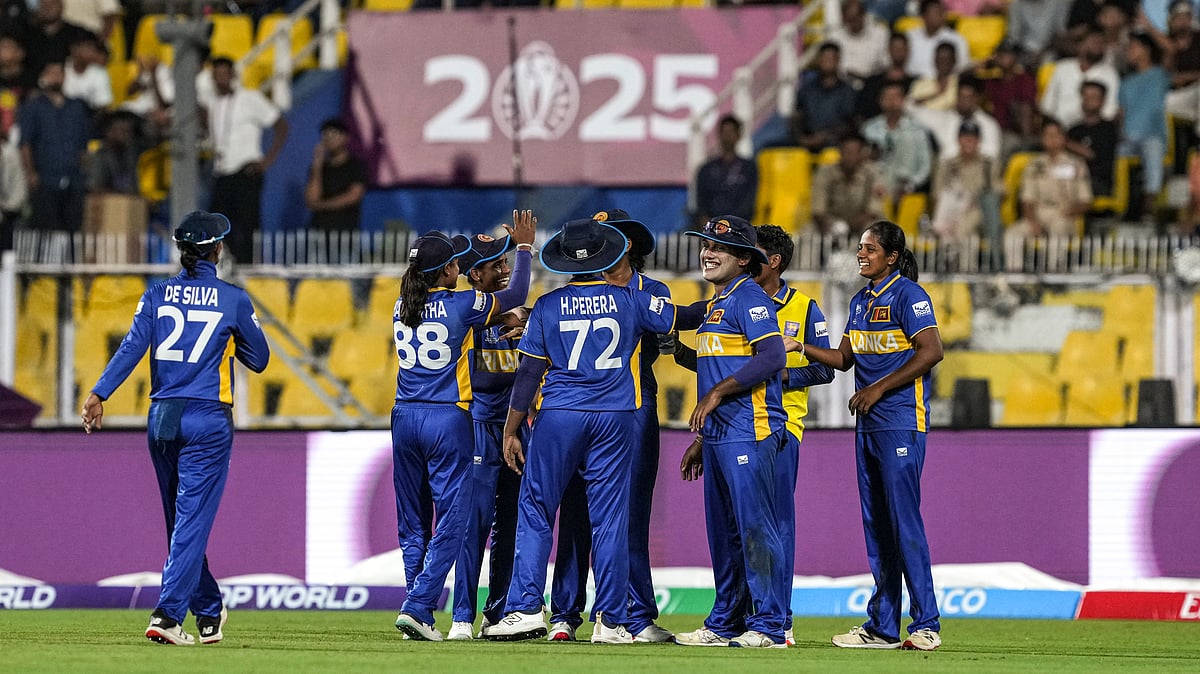 PTI/Swapan Mahapatra : Sri Lanka's players celebrate the wicket of India's Pratika Rawal during the ICC Women's Cricket World Cup 2025 match between India and Sri Lanka, at ACA Stadium, Barsapara, in Guwahati, Tuesday, Sept. 30, 2025.