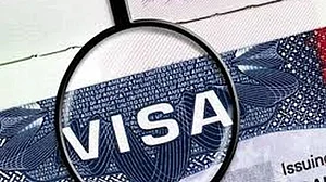 File photo : Trump Plans More H-1B Visa Restrictions After $100,000 Fee Hike