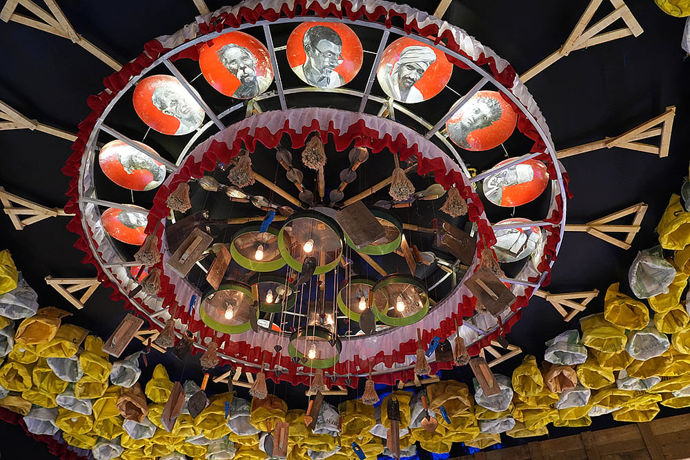 Durga puja 2025 Raipur club Ramgarh theme PORIJAYI Maigrant Labour