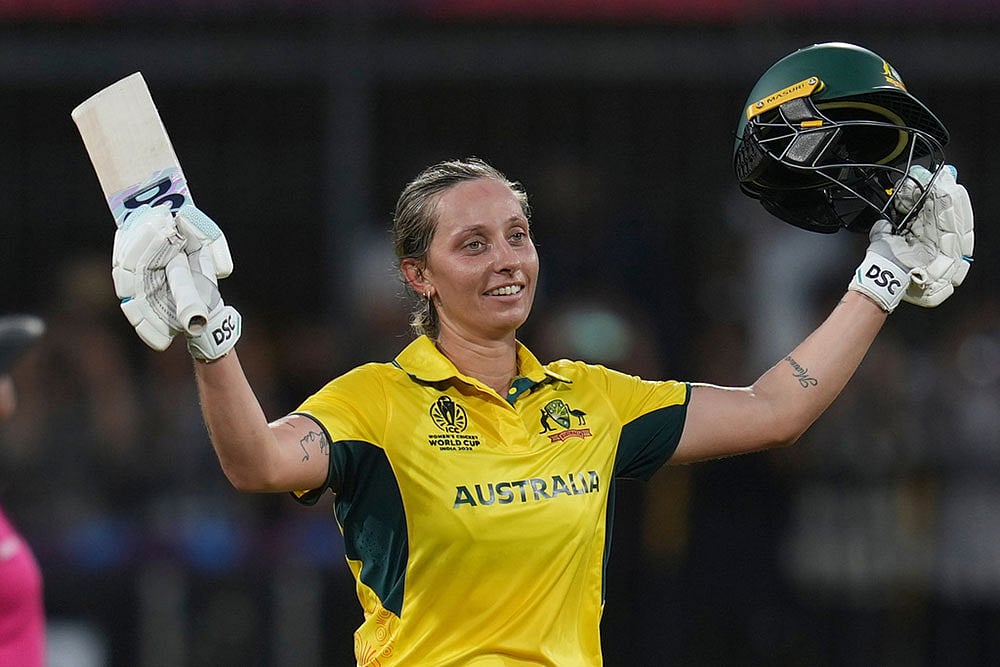 Australias Ashleigh Gardner celebrates her century