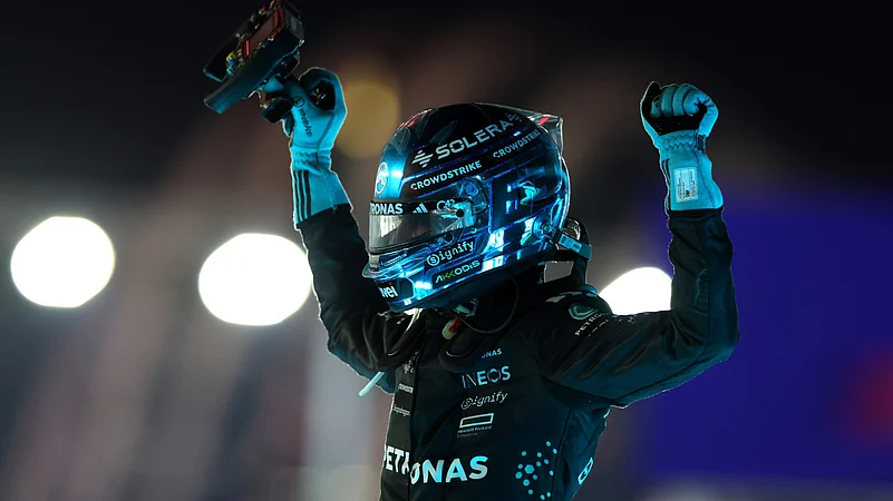 George Russell celebrates his win