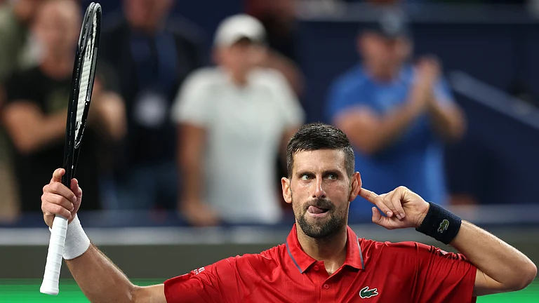 Novak Djokovic celebrates his win in Shanghai on Sunday - null