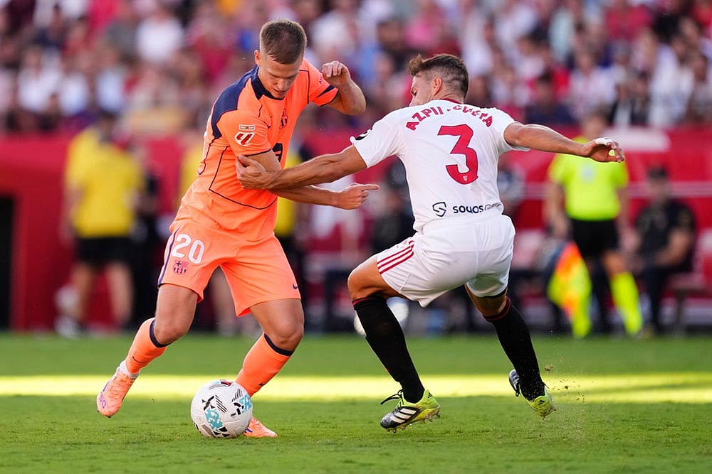 Spain soccer La Liga 2025-26 Sevilla vs Barcelona soccer match photos_Dani Olmo