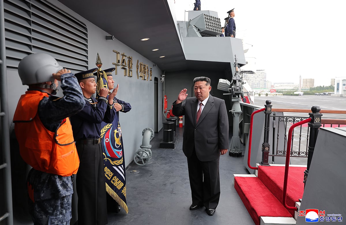 Korean Central News Agency/Korea News Service via AP : In this photo provided by the North Korean government, North Korean leader Kim Jong Un, center, visits the Choe Hyon destroyer Sunday, Oct. 5, 2025, at undisclosed location, North Korea. Independent journalists were not given access to cover the event depicted in this image distributed by the North Korean government. The content of this image is as provided and cannot be independently verified. Korean language watermark on image as provided by source reads: "KCNA" which is the abbreviation for Korean Central News Agency.