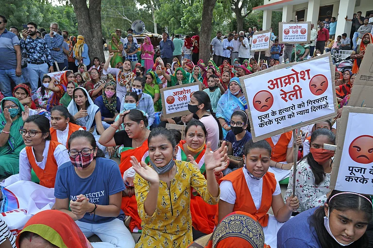 People protest for justice in Rajasthan People shouts slogans in a protest rally in demand of justice for deceased Pooja Chauhan who was allegedly murdered by the members of her in-laws for dowry in Beawar
- Outlook India