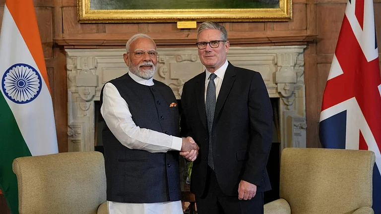 Britain's Prime Minister Keir Starmer and Indian Prime Minister Narendra Modi | - AP Photo/Kin Cheung, Pool