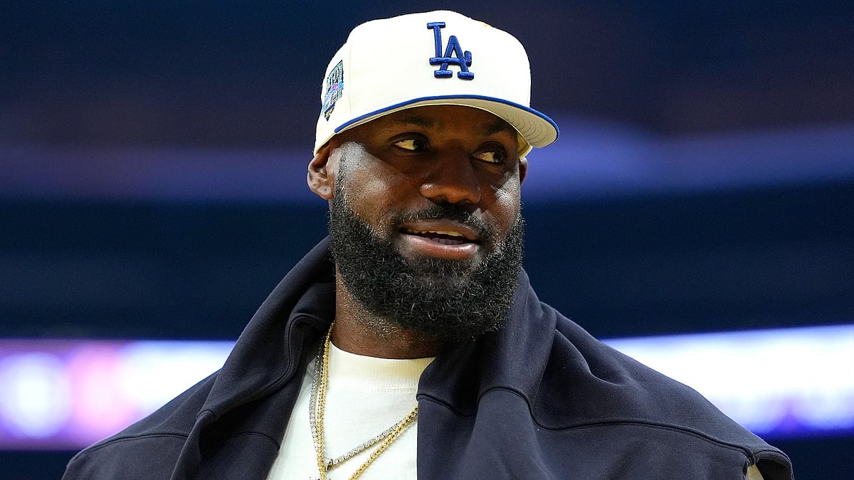 Lebron James #23 of the Los Angeles Lakers looks on against the Golden State Warriors during a time out in the first half of a preseason NBA game at Chase Center on October 05, 2025 in San Francisco, California.