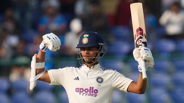 Yashasvi Jaiswal celebrates after scoring 150 runs on the first day of the second Test between India and West Indies at the Arun Jaitley Stadium in New Delhi. - AP